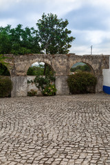 Fototapeta na wymiar Antique Aqueduct Arches of 16th century - Obidos, Portugal