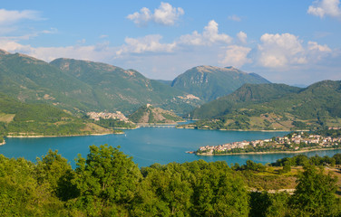 Fototapeta na wymiar Turano lake (Rieti, Italy) and the town of Castel di Tora