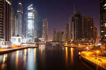 DUBAI, UAE - FEBRUARY 2018: View of modern skyscrapers at night  in Dubai Marina in Dubai, UAE.