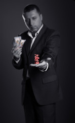Blurred casino player with an accent in his hands. Gambling concept