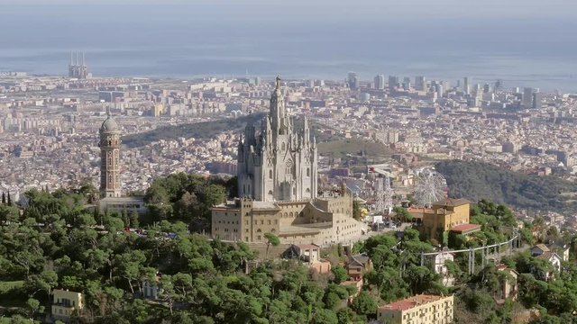 Aerial view of Tibidabo at daylight with amusement park