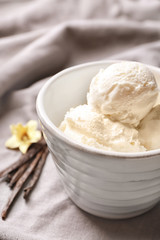 Bowl with delicious vanilla ice cream, closeup