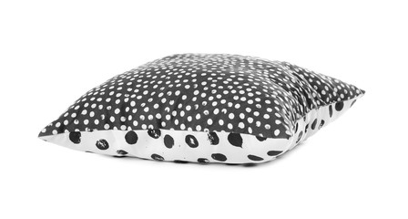 Stylish spotted pillow on white background