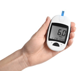 Woman holding digital glucometer on white background. Diabetes concept