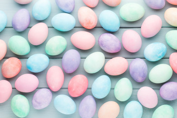 Pastel Easter eggs background. Spring greating card.