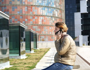 Fototapeta premium Teenage boy typing text message.Using smart phone