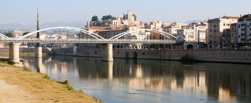 Day view of Pont de  Estat over Ebro river  and Suda Castle in Tortosa, Spain