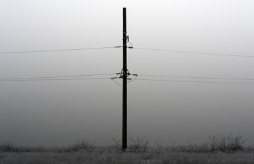 Electric pole in the field