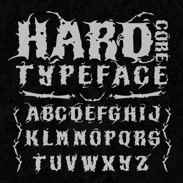 Hardcore Typeface. Stylish Grunge Font On Grunge Background, Good For Labels, Logos, Posters, Tee-shirts.