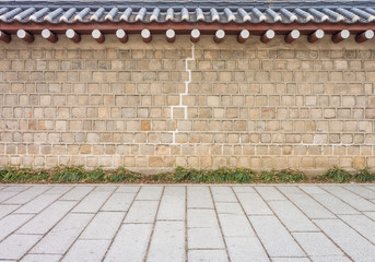 Old Korean-style wall and pavement. It is an ancient building at Gyeongbokgung Palace.
