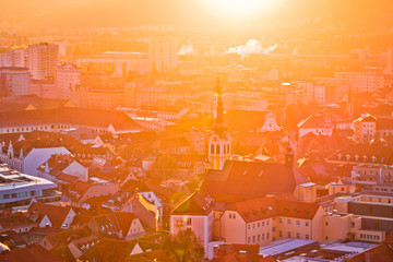 Graz city center aerial sun haze view