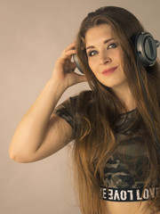 Teen women wearing headphones