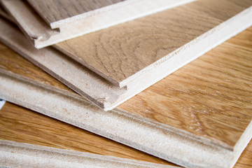 Naklejka na ściany i meble Samples of laminate and parquet board. Selection and types of floor coverings.