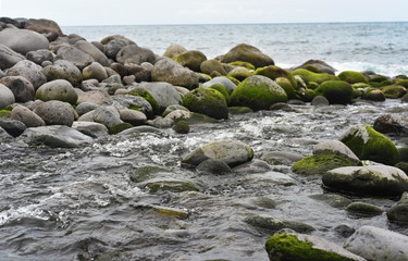 Group of stones near Atlantic ocean coast.