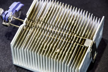 Dirty dusty radiator computer processor. Details of the computer's system unit.