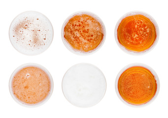 Glass of lager ale beer top view with foam