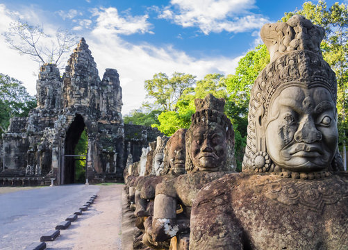 Row of demons  statues in the South Gate of Angkor Thom complex, Siem Reap, Cambodia
