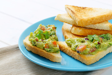 toasted bread with guacamole