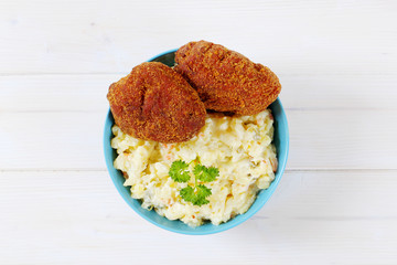 breaded burgers with potato salad