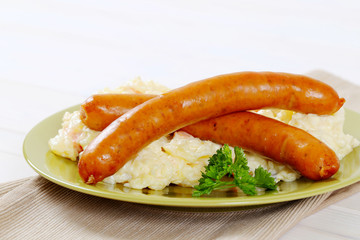thin sausages with potato salad