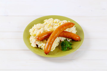 thin sausages with potato salad