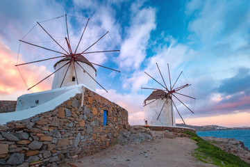 Famous view, Traditional windmills on the island Mykonos, The island of the winds, at sunrise, Greece