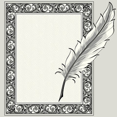 Feather quill pen and ornate frame