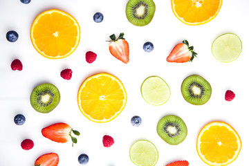 Fototapeta premium Sliced fruits on white background