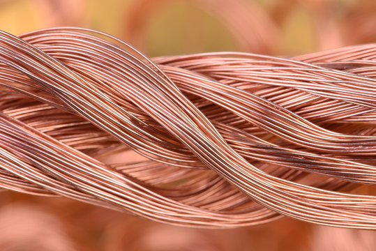 Bundle of copper wire on blurred background