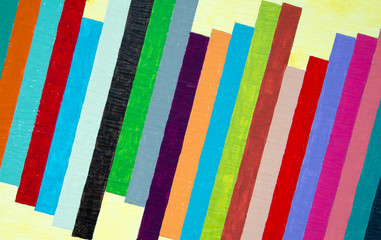 Fototapeta na wymiar Colorful painted stripes on pale yellow background