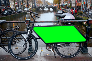 Fototapeta na wymiar Bicycle Public Advertising. Public Bicycle parking Amsterdam, Netherlands.