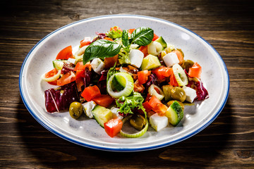 Caesar salad  on wooden background