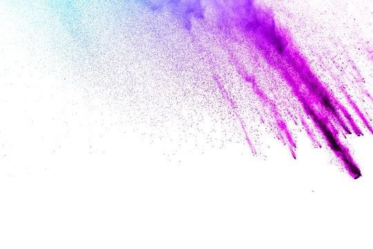 Blue-Purple color powder explosion cloud isolated on white background.Closeup of Blue-Purple dust particles splash isolated on  background.