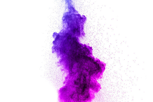 Blue-Purple color powder explosion cloud isolated on white background.Closeup of Blue-Purple dust particles splash isolated on  background.