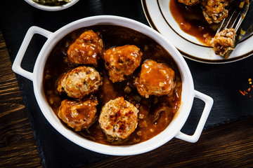 Roasted meatballs, potatoes and vegetables