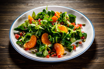 Vegetable salad on wooden background