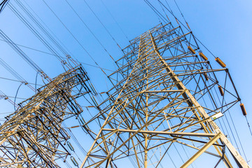 telegraph poles with blue sky