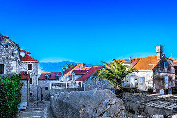 Fototapeta premium Supetar town mediterranean scenery. / Scenic view at picturesque town streets in mediterranean place Supetar on Brac island, Croatia.