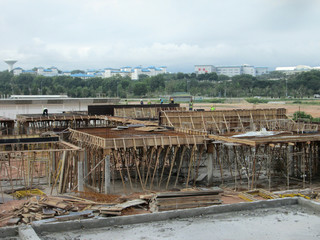 Construction workers fabricated timber form work at the construction site. Form work made from plywood and timber. 