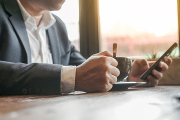 close up business man with coffee cup.
