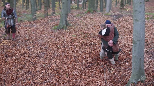 Vikings have some fun. Vikings fighting playful with each other