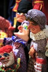 Group of thread marionettes in a theater