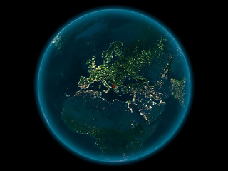 Albania on planet Earth in space at night
