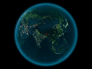 Bhutan on planet Earth in space at night