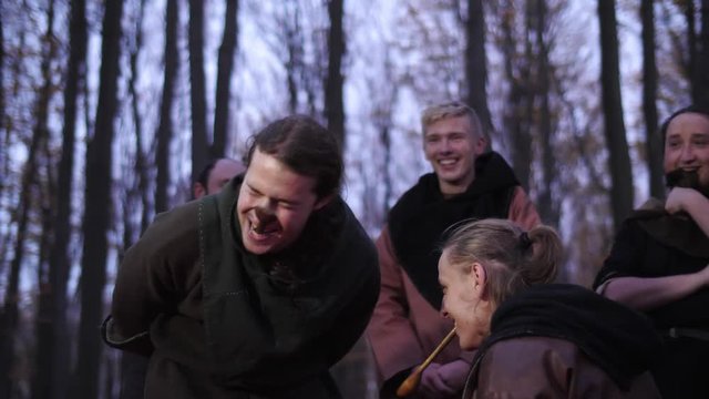 Vikings have some fun. Viking play with spoons