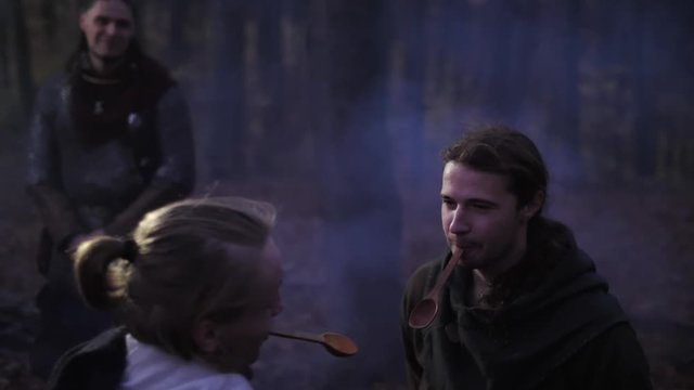 Vikings have some fun. Viking play with spoons