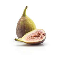 One fig and a half with rose flesh isolated on white background ripe fresh purple green.