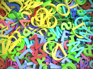 Fototapeta na wymiar Piled colorful alphabet fonts