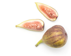 One fig and two slices top view isolated on white background ripe purple green rose flesh.