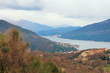Fototapeta premium Mediterranean landscape on a cloudy winter day. Montenegro, view of Bay of Kotor near Herceg Novi city